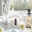 Pairfum room perfume spray luxury scented candle and hand & body wash in bathroom sunshine