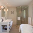 PAIRFUM natural reed diffuser on the marble top of in a classically French but luxurious bathroom