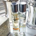 pairfum petite perfume room spray on window sill in modern livingroom with chrome decor
