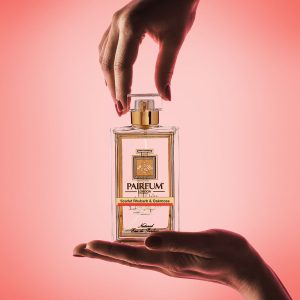 Pairfum Eau De Parfum Bottle Hands Scarlet Rhubarb Oakmoss