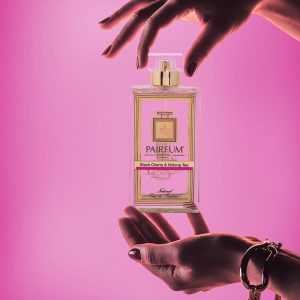 Pairfum Eau De Parfum Bottle Woman Hands Black Cherry Oolong Tea